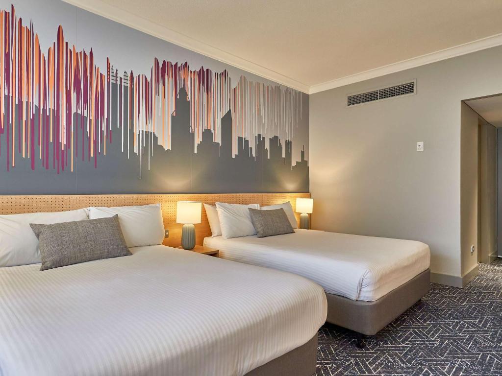 Postel nebo postele na pokoji v ubytování Mercure Perth