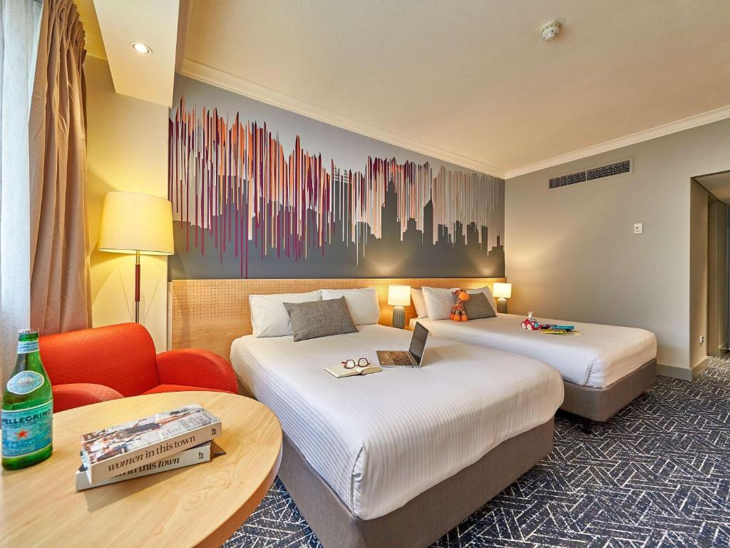 Postel nebo postele na pokoji v ubytování Mercure Perth