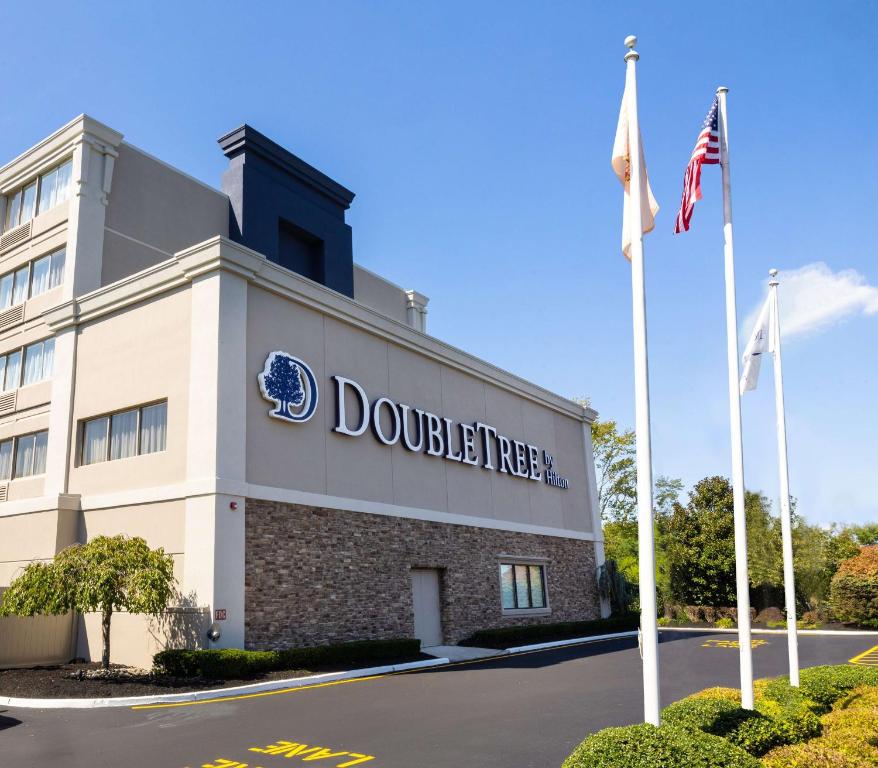 a building with the words doubletree at DoubleTree by Hilton Tinton Falls-Eatontown in Tinton Falls