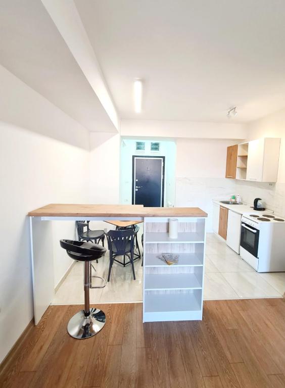 Kuchyň nebo kuchyňský kout v ubytování Urban Serviced Apartments