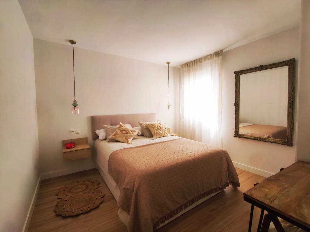 En eller flere senge i et værelse på Casa Carmela Fuengirola