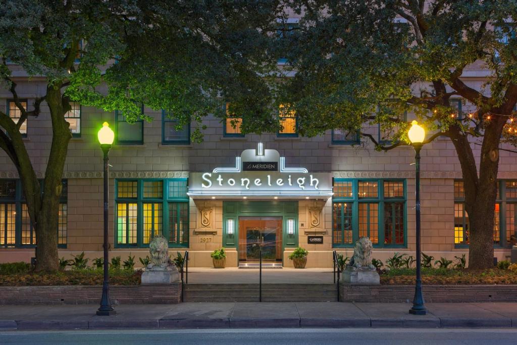 a sign on the front of a building at Le Meridien Dallas, The Stoneleigh in Dallas