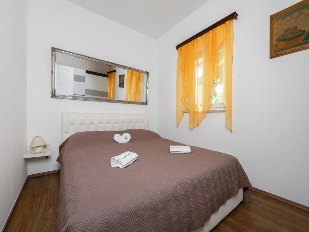 Postel nebo postele na pokoji v ubytování Villa St Nikola with jacuzzi and private swimming pool