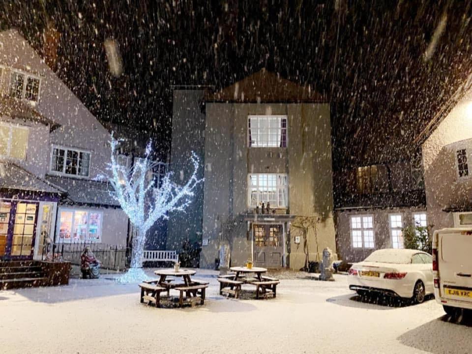 a group of picnic tables in the snow at Hatters Hotel in Skegness