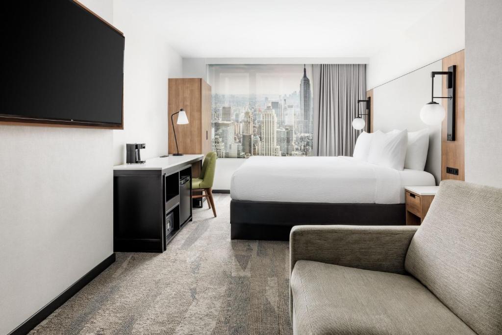 TV a/nebo společenská místnost v ubytování Fairfield Inn & Suites by Marriott New York Manhattan/Times Square South