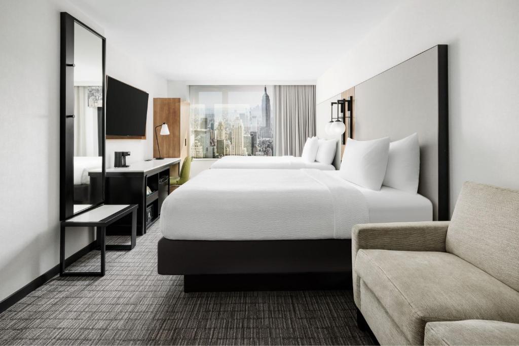 Postel nebo postele na pokoji v ubytování Fairfield Inn & Suites by Marriott New York Manhattan/Times Square South