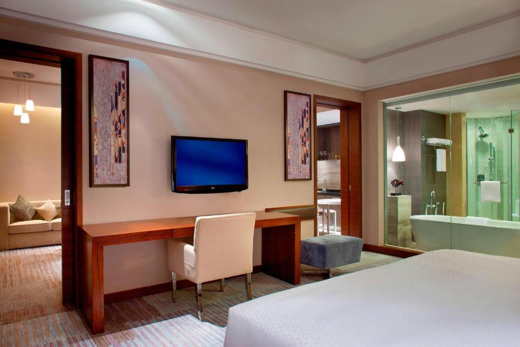 Postel nebo postele na pokoji v ubytování Four Points by Sheraton Taicang