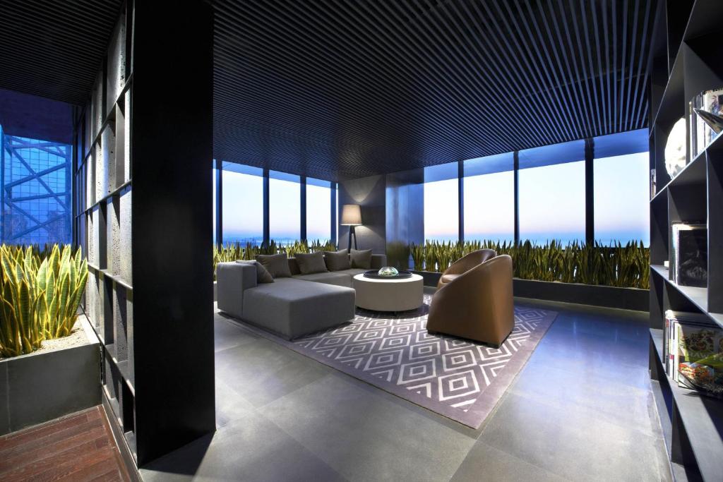 Posezení v ubytování Four Points by Sheraton Qingdao, West Coast