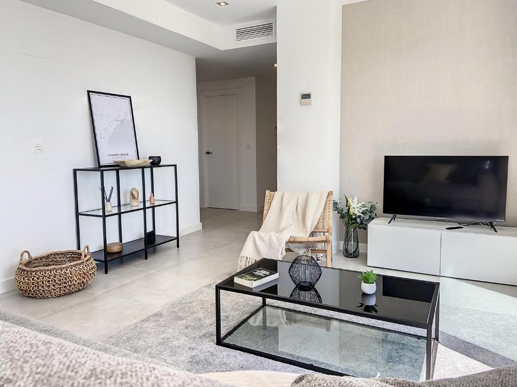 Televízia a/alebo spoločenská miestnosť v ubytovaní Via Celere 2336 Luxury Sea View Penthouse