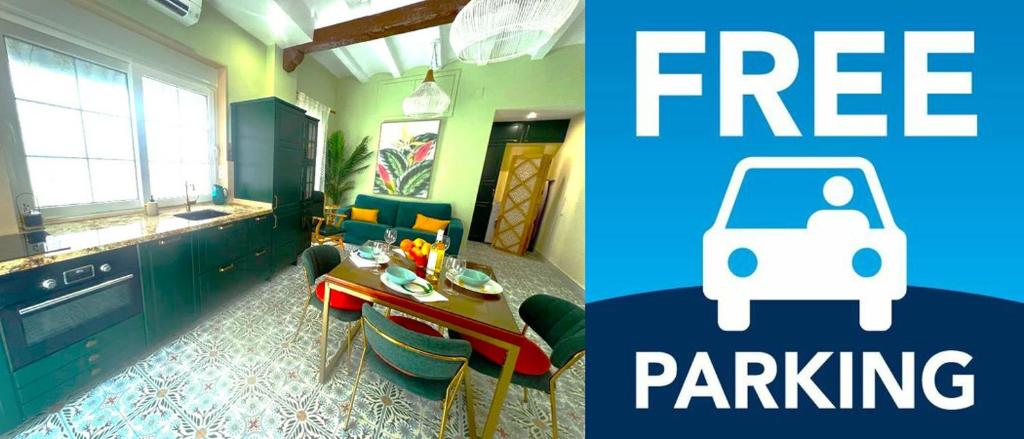 eine Küche mit einem Tisch und eine Küche mit einem Auto drauf in der Unterkunft Esmeralda Apartment With Free Private Underground Parking in Valencia
