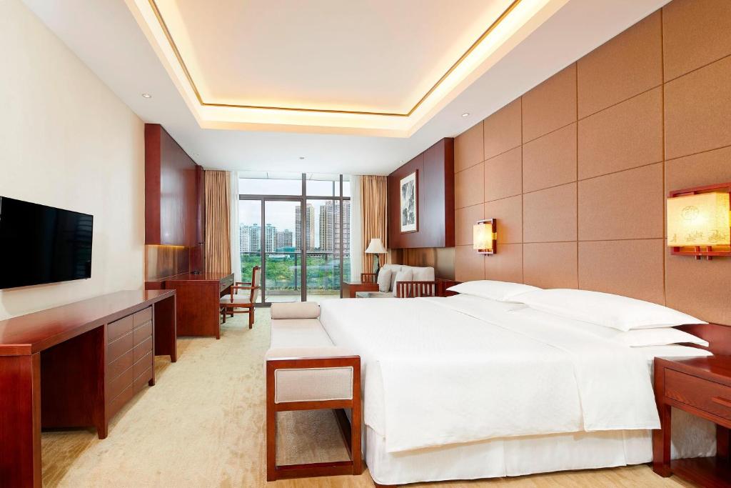 Postel nebo postele na pokoji v ubytování Four Points by Sheraton Danzhou