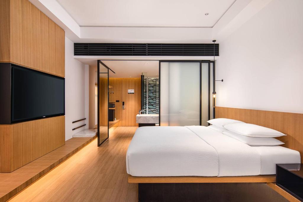Postel nebo postele na pokoji v ubytování Fairfield by Marriott Jingzhou