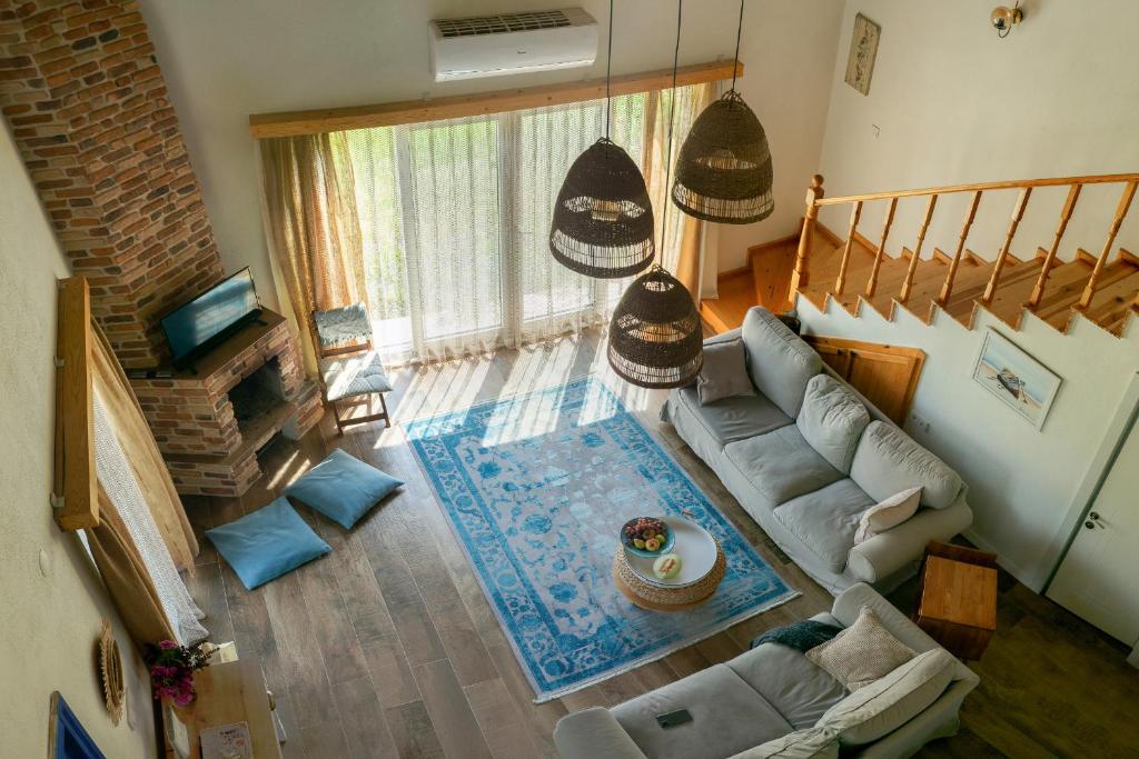 an overhead view of a living room with a couch at Masal Evimiz in Antalya