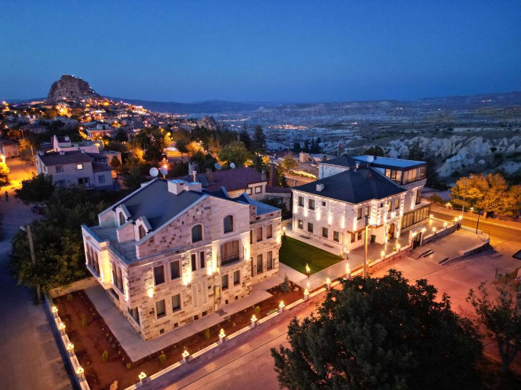 an aerial view of a large building at night at Remus Romulus Cappadocia in Uçhisar