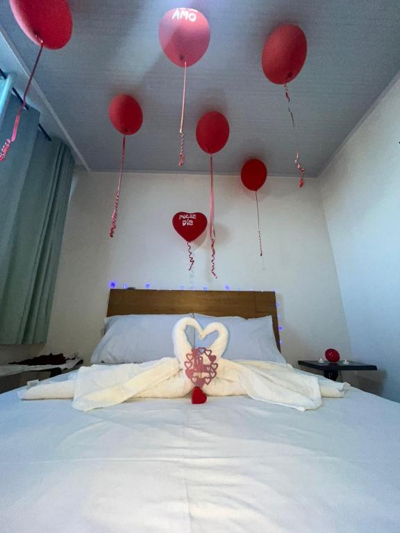 Postel nebo postele na pokoji v ubytování Hotel Olam Confort