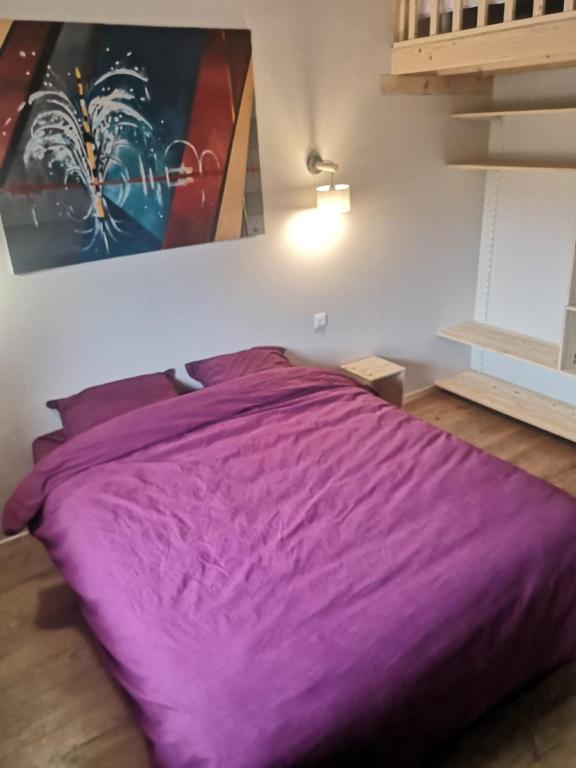 Postel nebo postele na pokoji v ubytování Aux Buis Gourmands