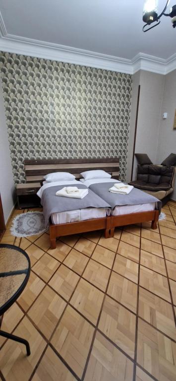 Postel nebo postele na pokoji v ubytování Hotel Villa