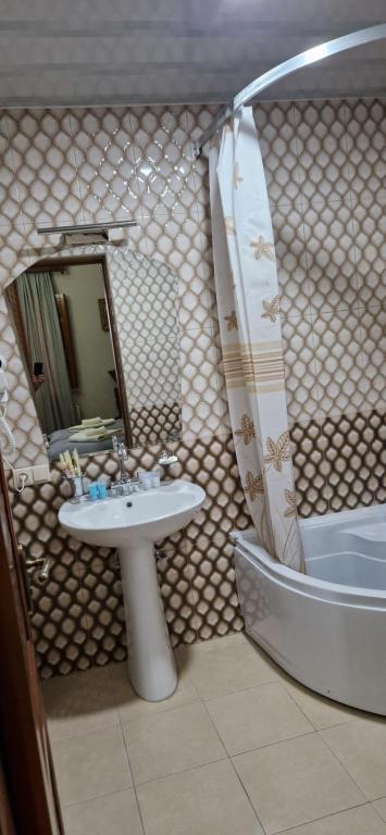 Koupelna v ubytování Hotel Villa
