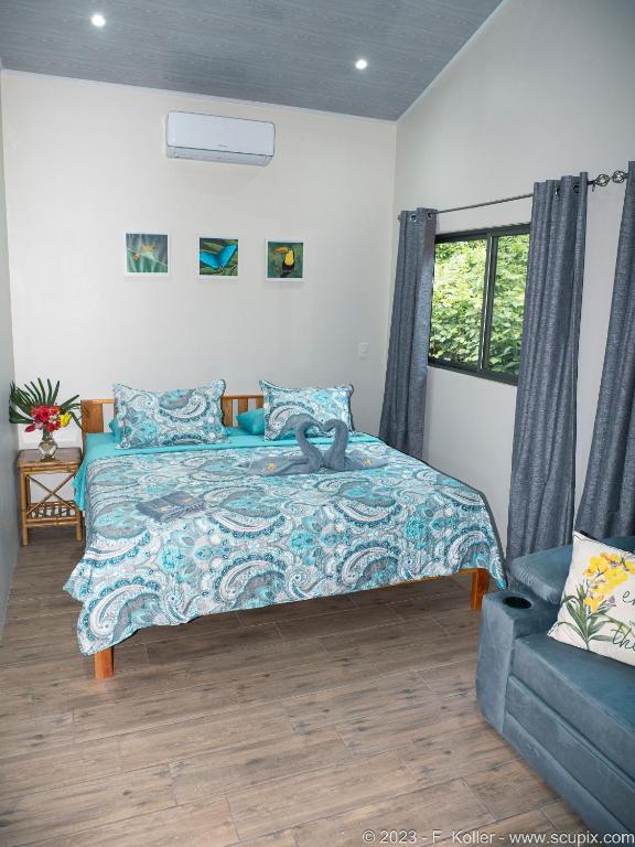 Postel nebo postele na pokoji v ubytování Luxury Apartments Nauyaca by Paradiselodge