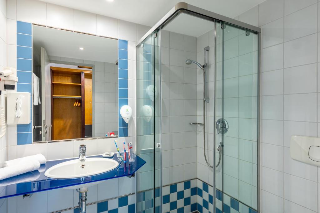 Koupelna v ubytování Hotel Leipheim Süd