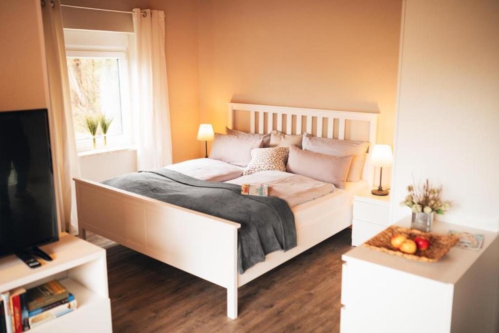 Кровать или кровати в номере Haus Jelena Appartement 5