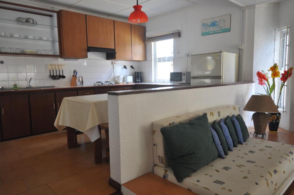 Kuchyň nebo kuchyňský kout v ubytování La Pointe Villas