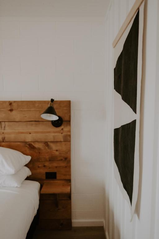 Postel nebo postele na pokoji v ubytování Triangle Motel