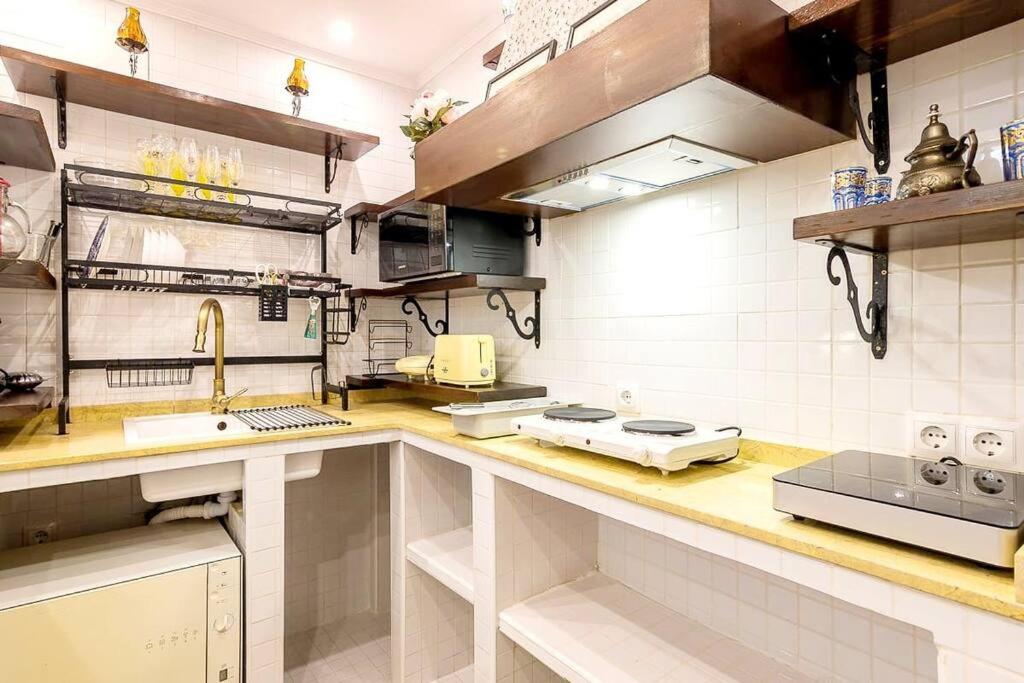 Kuchyňa alebo kuchynka v ubytovaní Precioso Apartamento centrico
