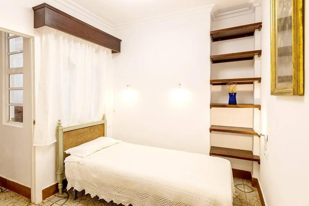 Posteľ alebo postele v izbe v ubytovaní Precioso Apartamento centrico