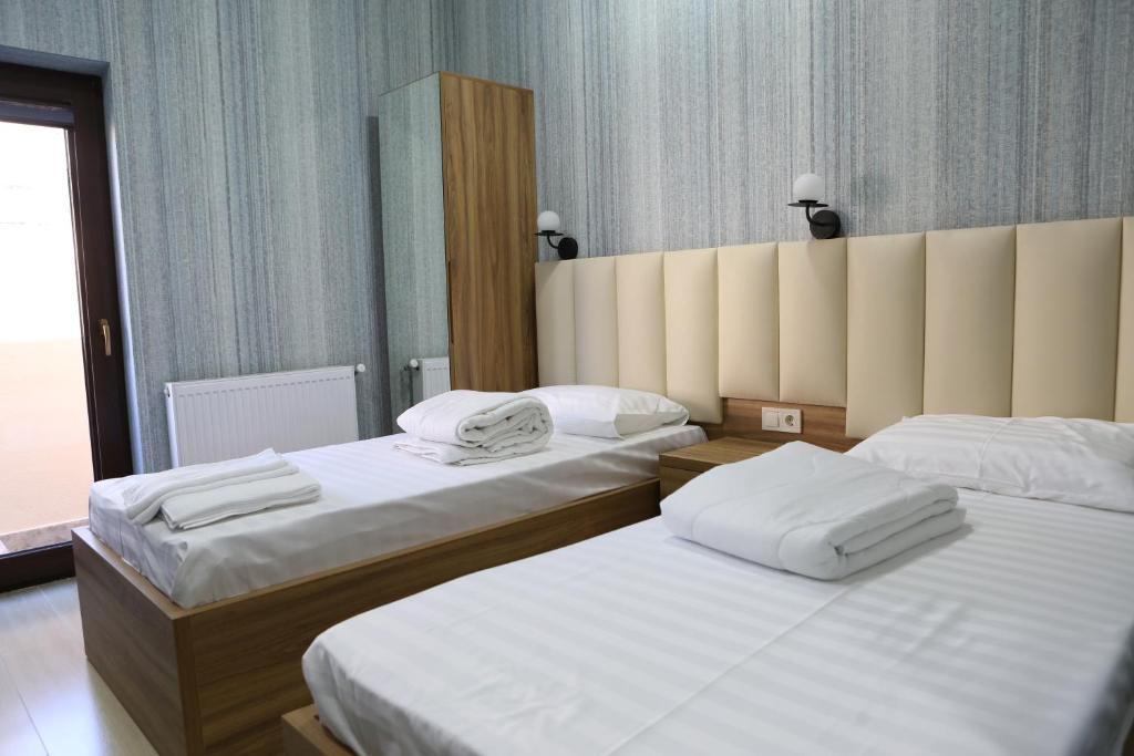 Postel nebo postele na pokoji v ubytování Luxor Rabath