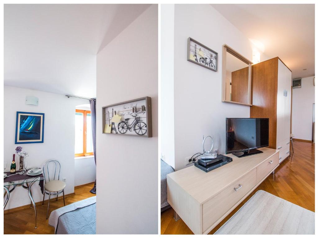Televízia a/alebo spoločenská miestnosť v ubytovaní Sunny Promenade Studio