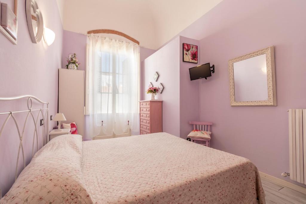 Posteľ alebo postele v izbe v ubytovaní Hotel Albachiara