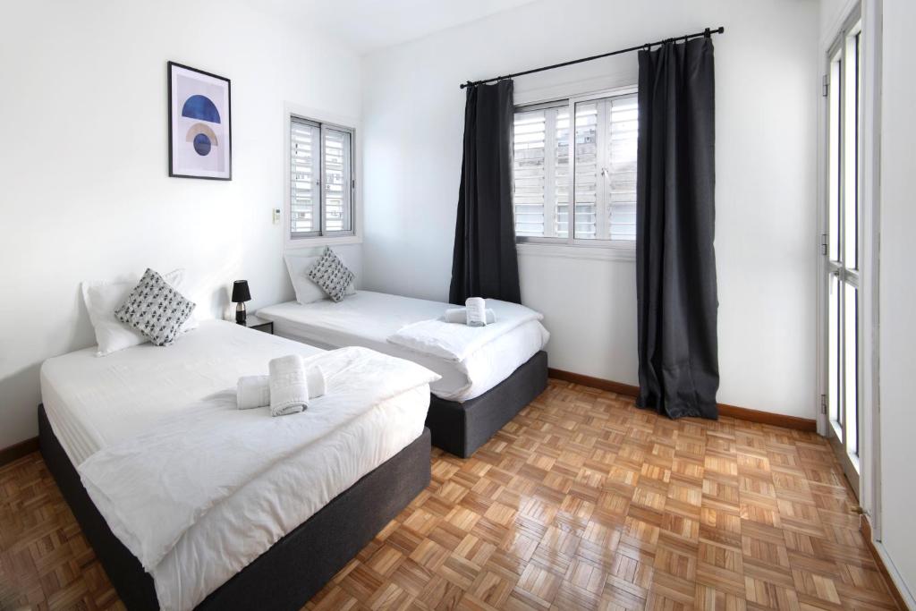 Postel nebo postele na pokoji v ubytování Urban Condo 10 - 2 Bdr