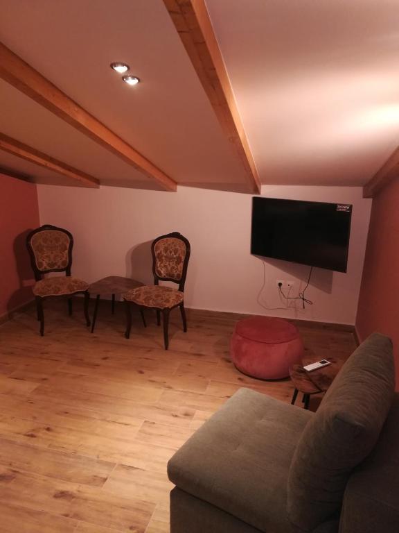 TV a/nebo společenská místnost v ubytování Iliana