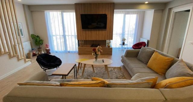 Гостиная зона в Duplex in four seasons new gudauri near gondola