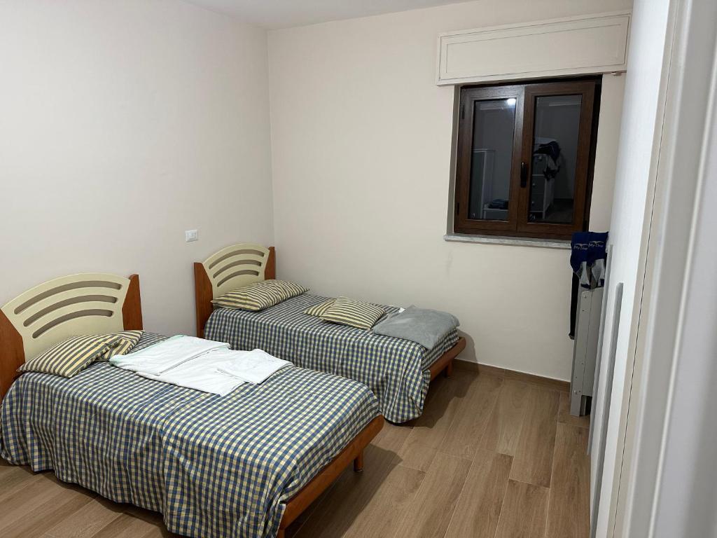Postel nebo postele na pokoji v ubytování Casa Nastro