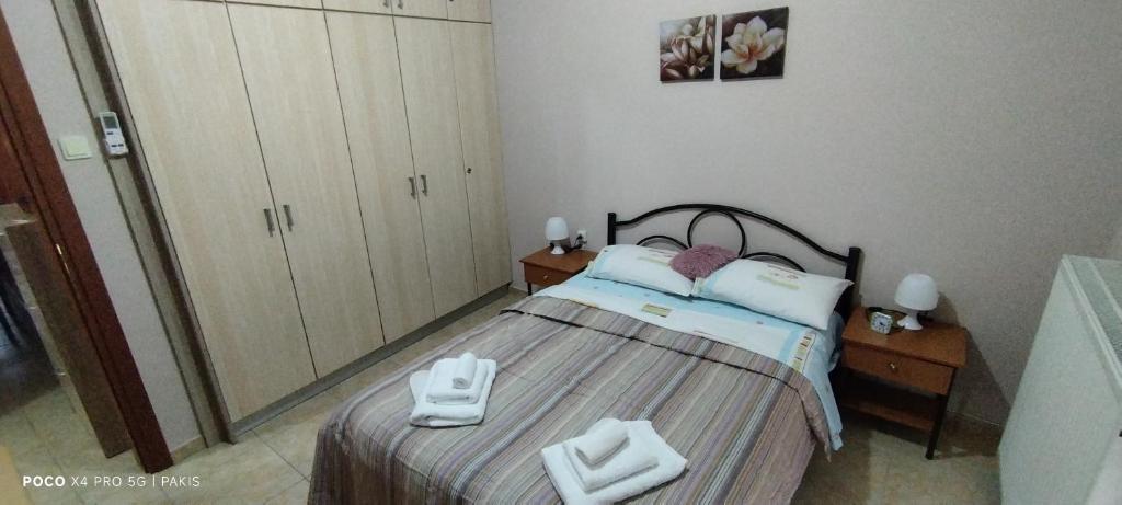 Postel nebo postele na pokoji v ubytování Δ2