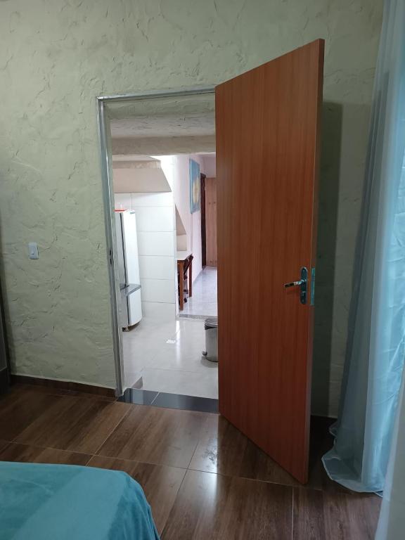 Postel nebo postele na pokoji v ubytování Suites em São Thomé das Letras