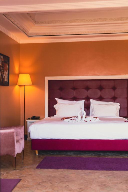 Postel nebo postele na pokoji v ubytování Palace Jena