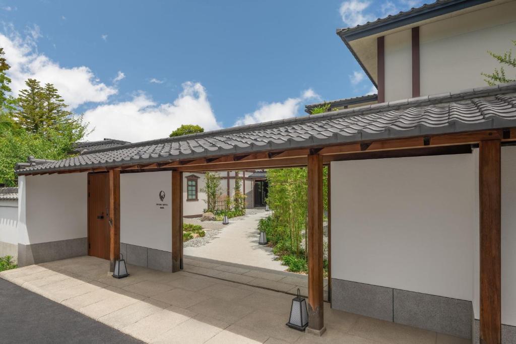 a house with two blank garage doors on a patio at Shisui, a Luxury Collection Hotel, Nara in Nara