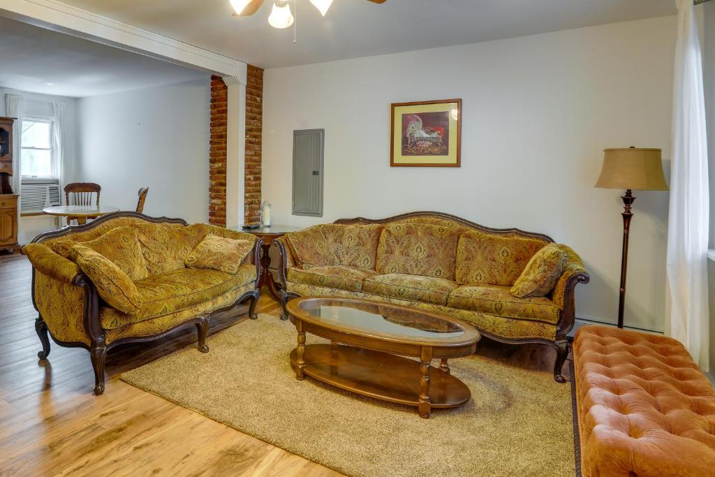 a living room with two couches and a coffee table at Centrally Located New Jersey Home with Private Yard in Lambertville