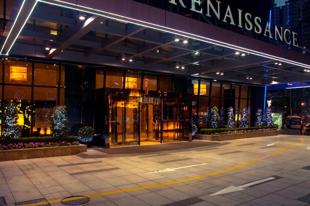 a store front of a building with christmas lights at Renaissance Shanghai Zhongshan Park Hotel in Shanghai