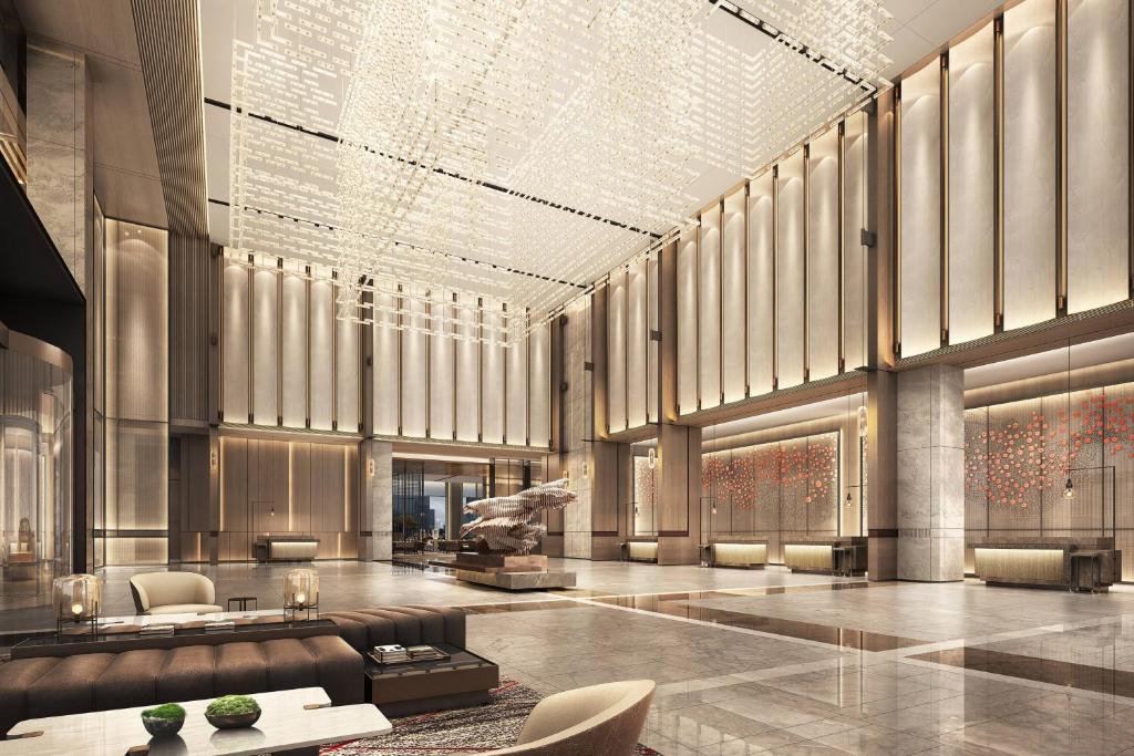 a rendering of a lobby of a building at Wuhan Marriott Hotel Hankou in Wuhan