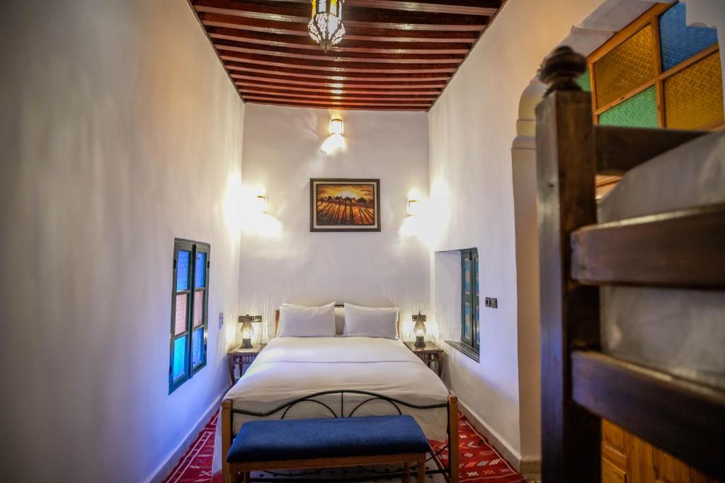Postel nebo postele na pokoji v ubytování Riad Fes Allouch
