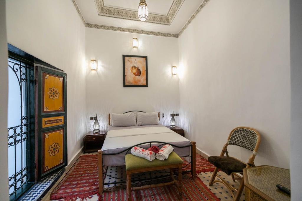 Postel nebo postele na pokoji v ubytování Riad Fes Allouch