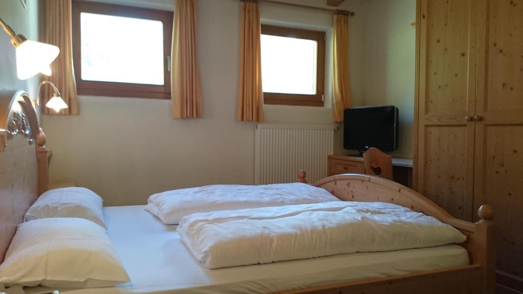 Postel nebo postele na pokoji v ubytování Hotel Jú Furcia