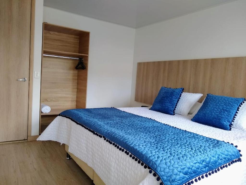 Postel nebo postele na pokoji v ubytování FEDERMAN PARK HOTEl