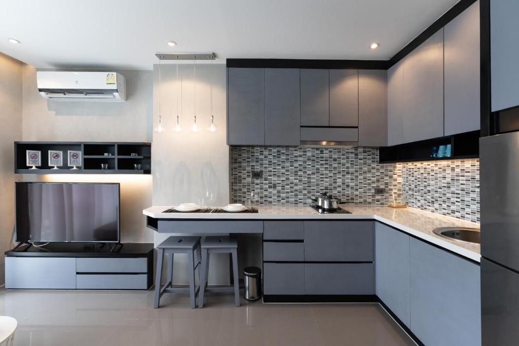Kuchyň nebo kuchyňský kout v ubytování Apartment 2 beds Citygate B717 by IBG Property