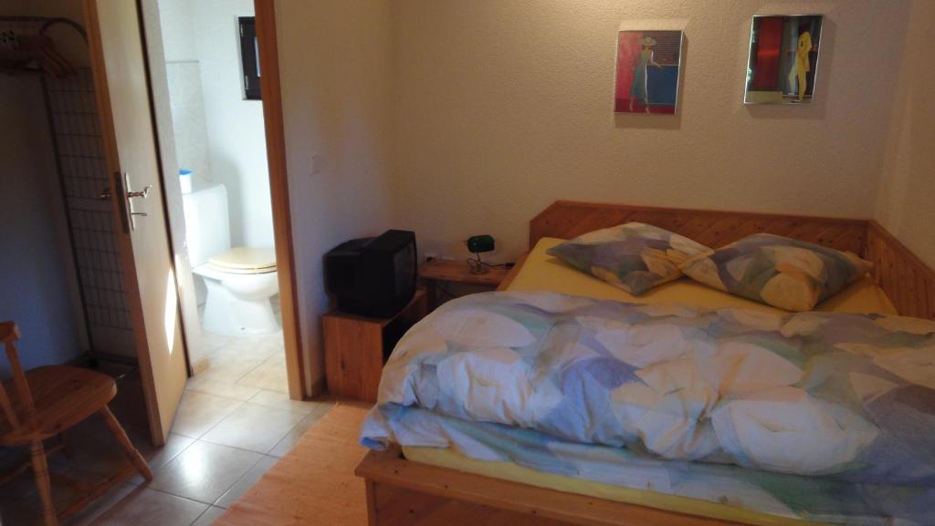 Postel nebo postele na pokoji v ubytování TRIXI´S GUESTHOUSE