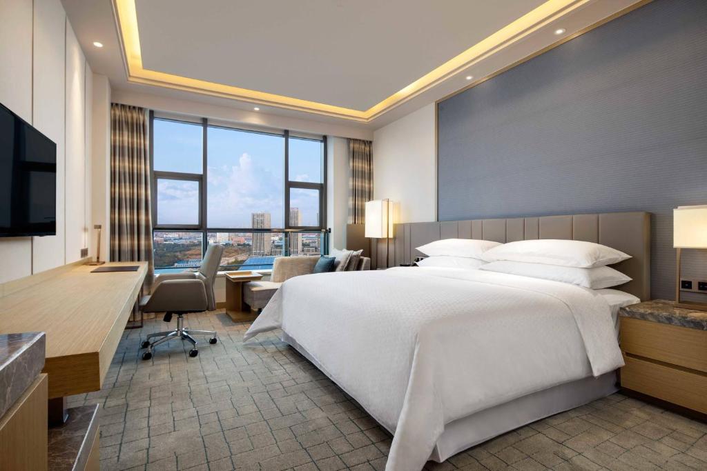Postel nebo postele na pokoji v ubytování Four Points by Sheraton Hefei, Baohe